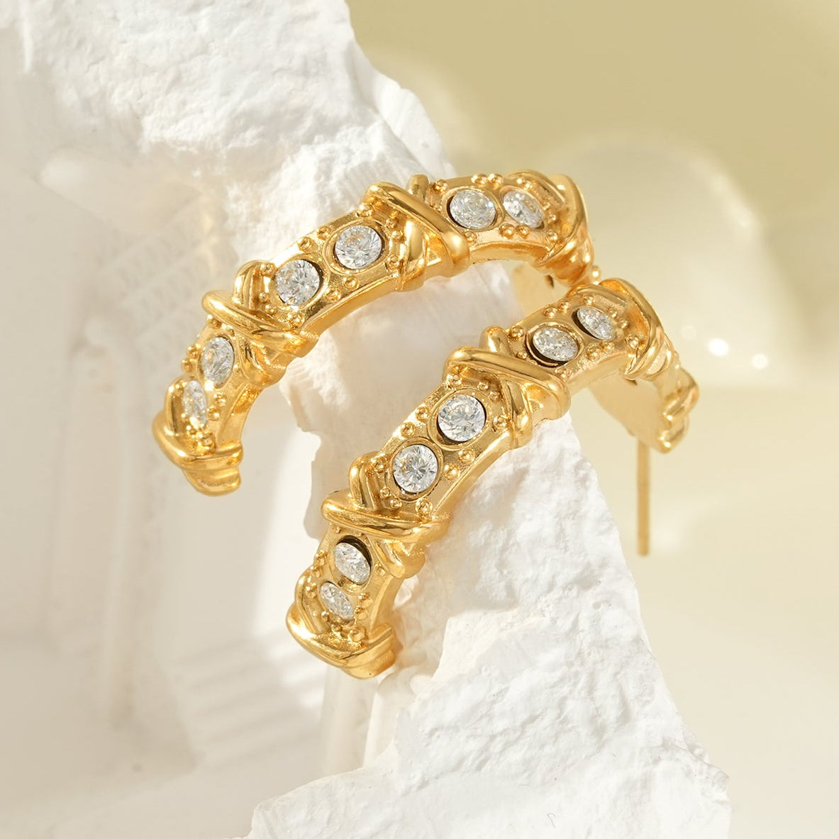 ELICA Gold: Zirconia Embedded Hoop Earrings with Ornate Detail & Crisscross Accents
