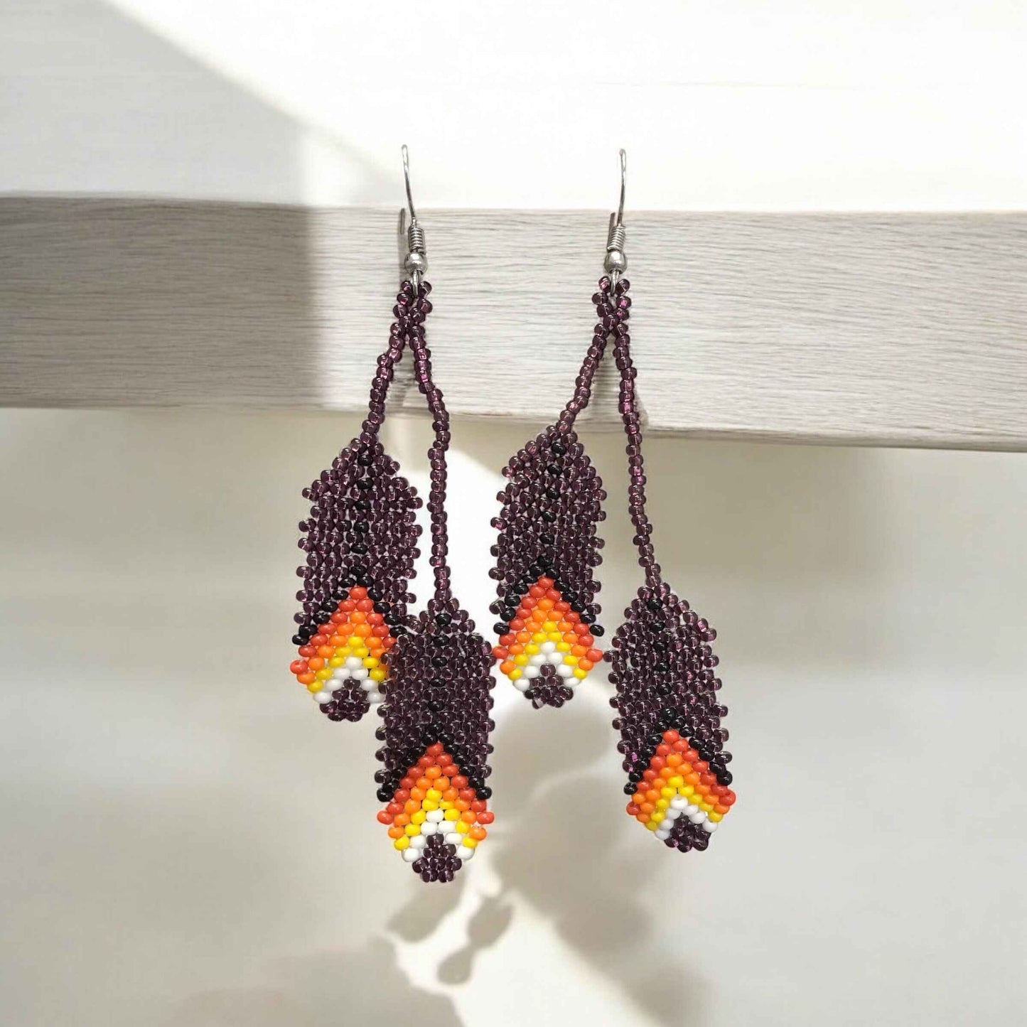 OldTribes™ blackberry beaded Feather earrings