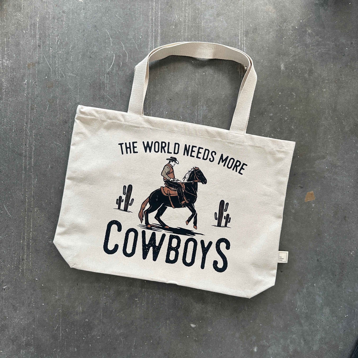 The World Needs More Cowboys Tote Bag