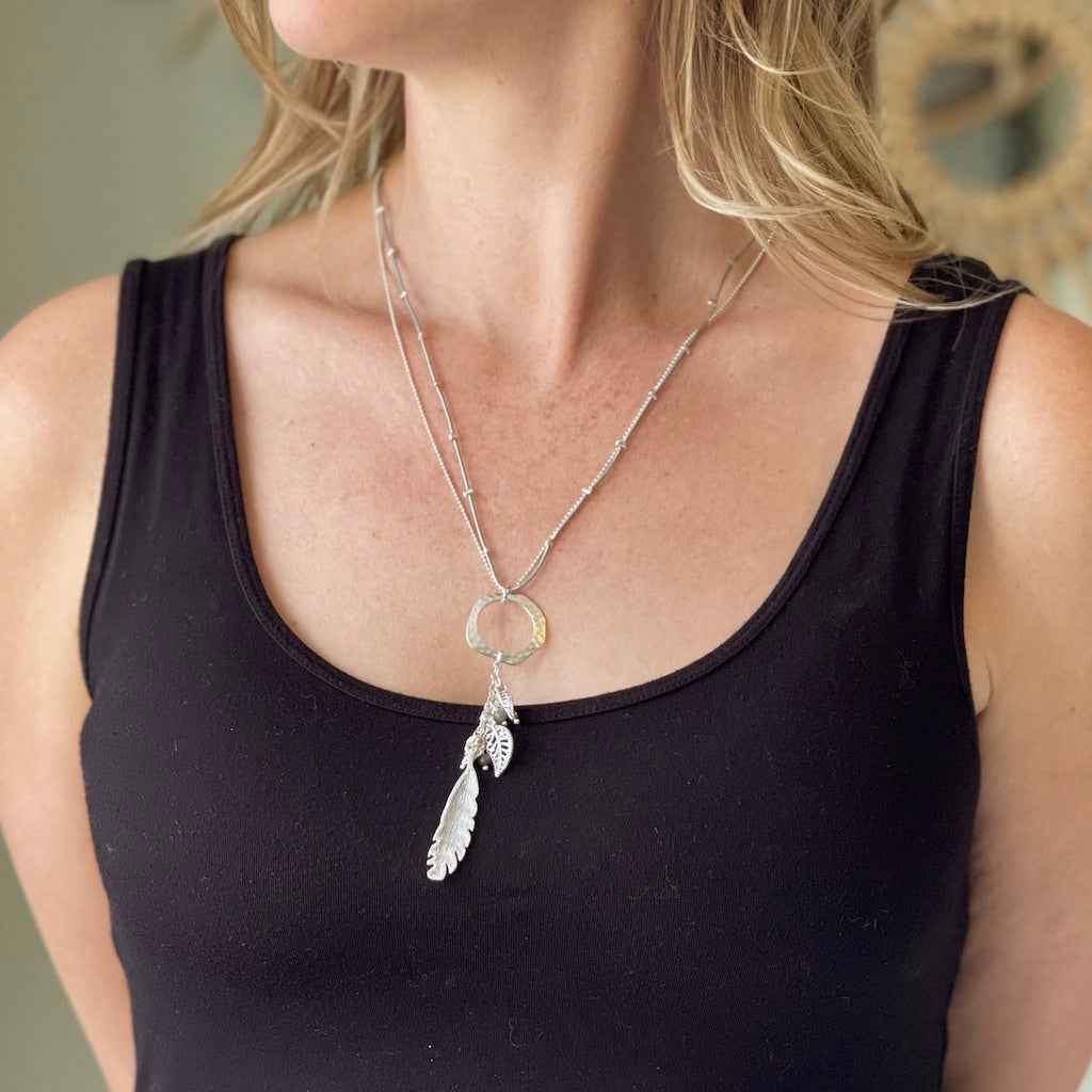 Beaten Ring Necklace With Leaf Charms In Silver Plate