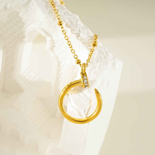 CSENGE Gold Necklace:  Zirconia Embedded Circular Nail Pendant on a Satellite Beaded Chain