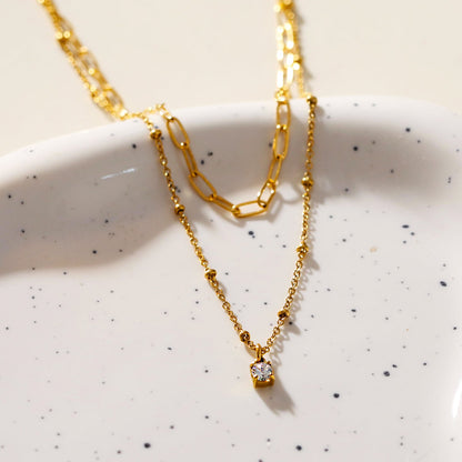 KATERI Gold: Pre-Layered Chains Necklace with a Solitaire Zirconia Charm Pendant